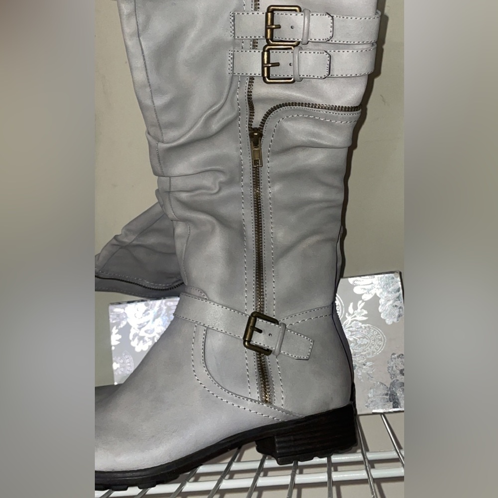 Brand new women’s knee boots in box